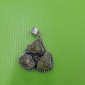 Peridot raw stone pendantPeridot raw stone pendant